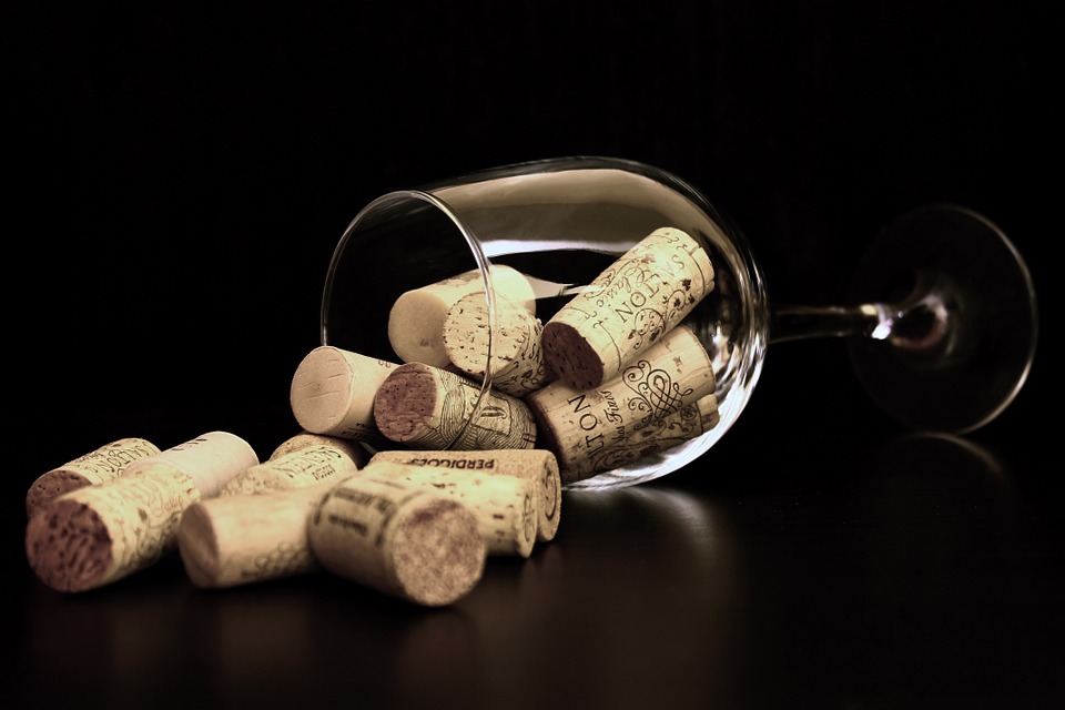 wine glass with corks inside